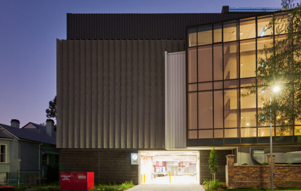 Ballet theatre building with louvres and custom facade screens.